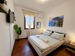 Postel nebo postele na pokoji v ubytování Casa vacanze Ciachea Home - Villa Accogliente con BBQ, Giardino e Parcheggio , A due Passi Da Palermo & Aereoporto