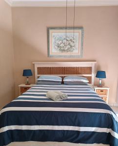 Ένα ή περισσότερα κρεβάτια σε δωμάτιο στο Seabrook Vacations Suite 212