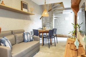 Posezení v ubytování Apt com piscina e churrasqueira VNR005