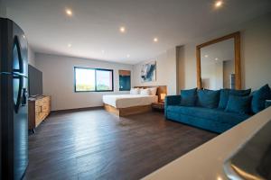 TV a/nebo společenská místnost v ubytování Casa de los Sueños Hotel Boutique