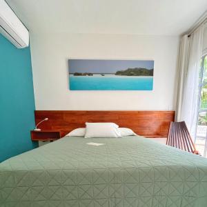Postel nebo postele na pokoji v ubytování Gran Jaguar Hotel