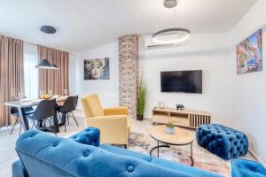 Μια τηλεόραση ή/και κέντρο ψυχαγωγίας στο Dimora 2 BDR apartment with free private parking