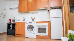 Η κουζίνα ή μικρή κουζίνα στο Apartment Airport Ifema Parking +2 φωτογραφίες