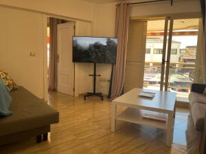 TV a/nebo společenská místnost v ubytování Nogalera Living Torremolinos Select