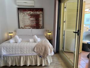 Postel nebo postele na pokoji v ubytování Nogalera Living Torremolinos Select