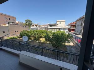 a view of a city from a balcony at Central Pompei Rooms in Pompei