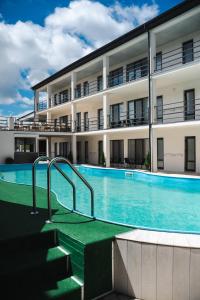 Фотография из галереи Міні-готель TURIN з басейном на Кароліно-Бугазі в Каролино-Бугазе