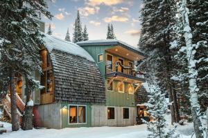 a house in the woods in the snow at Brighton Bonanza in Brighton