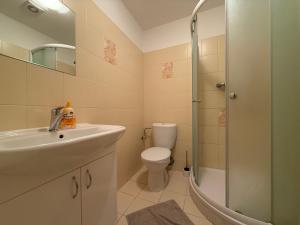 Koupelna v ubytování Penzion Apartmány Adamčík + 37 fotografií
