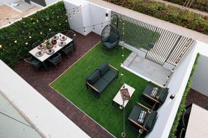 Istumisnurk majutusasutuses Elegant 4BR Villa, Luxury Pool Retreat, Joy, Arabiana Ranches 3