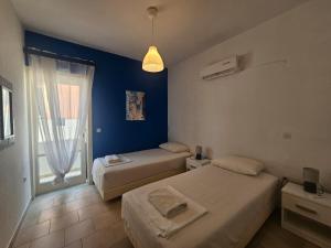 Posteľ alebo postele v izbe v ubytovaní Corfu Dream Holidays Villas