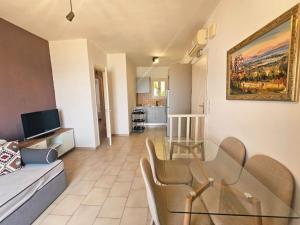 Televízia a/alebo spoločenská miestnosť v ubytovaní Corfu Dream Holidays Villas