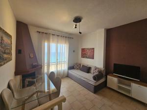 Televízia a/alebo spoločenská miestnosť v ubytovaní Corfu Dream Holidays Villas