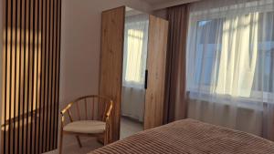 Posteľ alebo postele v izbe v ubytovaní Apartamenty Bujaki Ustroń