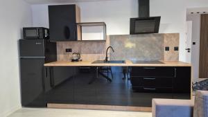 Kuchyňa alebo kuchynka v ubytovaní Apartamenty Bujaki Ustroń
