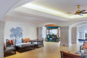 a living room with a couch and a table at Gateway Varkala in Varkala