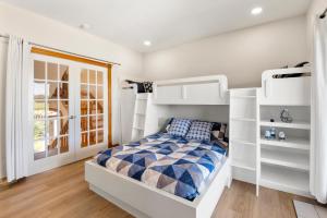 A bed or beds in a room at Changes In Attitude