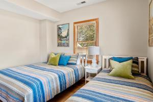 A bed or beds in a room at Changes In Attitude
