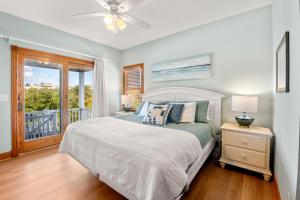 A bed or beds in a room at Changes In Attitude