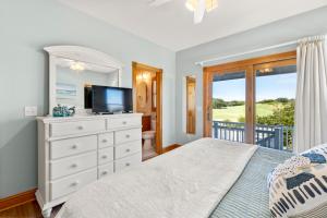 A bed or beds in a room at Changes In Attitude