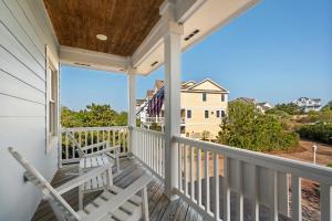 A balcony or terrace at Changes In Attitude