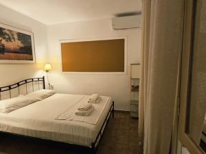 Posteľ alebo postele v izbe v ubytovaní Corfu Dream Holidays Villas