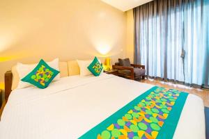 Postel nebo postele na pokoji v ubytování La ritz beach resort + 6 fotografií