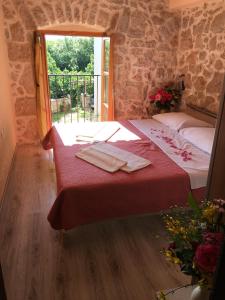 Postel nebo postele na pokoji v ubytování Holiday Home Rasopas