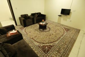 TV a/nebo společenská místnost v ubytování العييري للشقق المخدومة الدمام Al Eairy Serviced Apartments Dammam 7