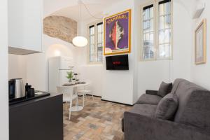Televisyen dan/atau pusat hiburan di Città Alta Home - 5min from BGY Airport, AC, WiFi