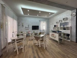 TV a/nebo společenská místnost v ubytování Hotel Eriale Nuova Gestione