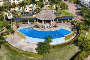 an aerial view of a swimming pool in a resort at Los Amores 09 in Bucerías