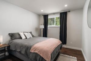 a bedroom with a bed and a window at Chalet Ankoay - Relaxation Nature & Private Spa in Saint Come +55 photos