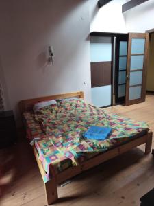 Ένα ή περισσότερα κρεβάτια σε δωμάτιο στο Vilnu Guest House