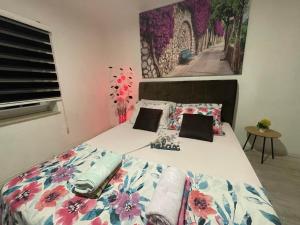 Postel nebo postele na pokoji v ubytování Zigana Apartments