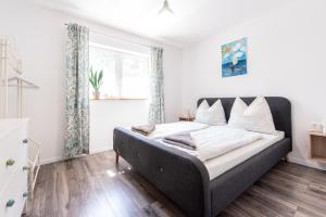 Ένα ή περισσότερα κρεβάτια σε δωμάτιο στο Apart ViLa