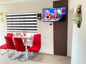 TV a/nebo společenská místnost v ubytování Zigana Apartments