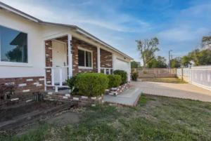 a brick house with a porch and a driveway at Wakefield Cozy Stay foosball FirePit Hammock in Los Angeles