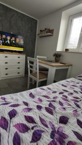 Katil atau katil-katil dalam bilik di Apartmán Hevlín