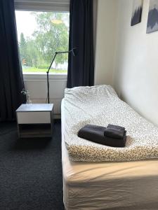 Giường trong phòng chung tại Rentalux Hostel - Modern Comfort, Single Rooms