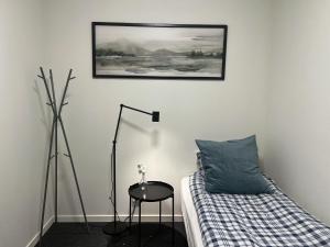 Giường trong phòng chung tại Rentalux Hostel - Modern Comfort, Single Rooms