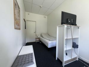 Giường trong phòng chung tại Rentalux Hostel - Modern Comfort, Single Rooms