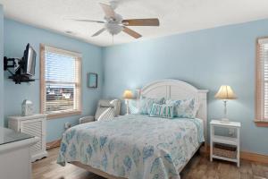 Postel nebo postele na pokoji v ubytování Ellington Cottage By The Sea