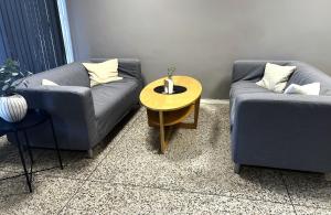 Khu vực ghế ngồi tại Rentalux Hostel - Modern Comfort, Single Rooms