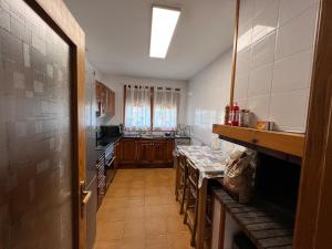 A kitchen or kitchenette at Casa Bellavista con piscina en Caldes Costa Brava