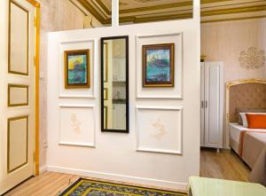 Postel nebo postele na pokoji v ubytování Alhambra Apart Hotel