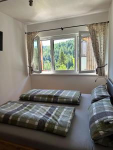 Posteľ alebo postele v izbe v ubytovaní Apartment Bella