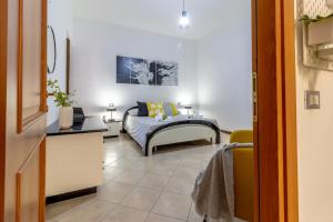 a living room with a couch and a table at Ripresa 117 in Rieti