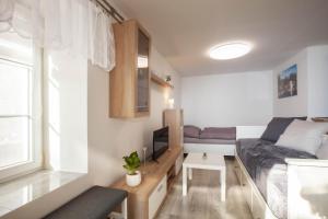 Posezení v ubytování Apartmány SKÁLY