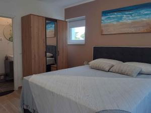 Postel nebo postele na pokoji v ubytování Apartment in Malinska - Insel Krk 42222